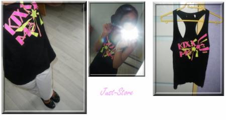 Top noire avec motif .